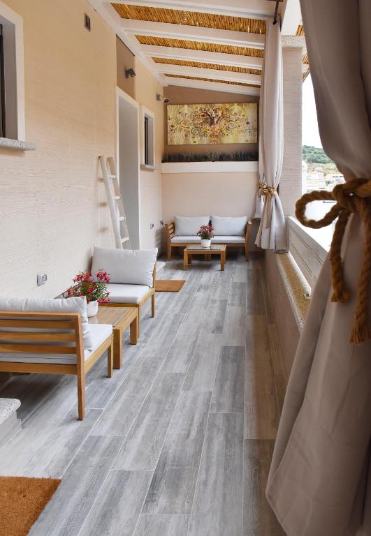 Posezení v ubytování Elis b&b Villasimius