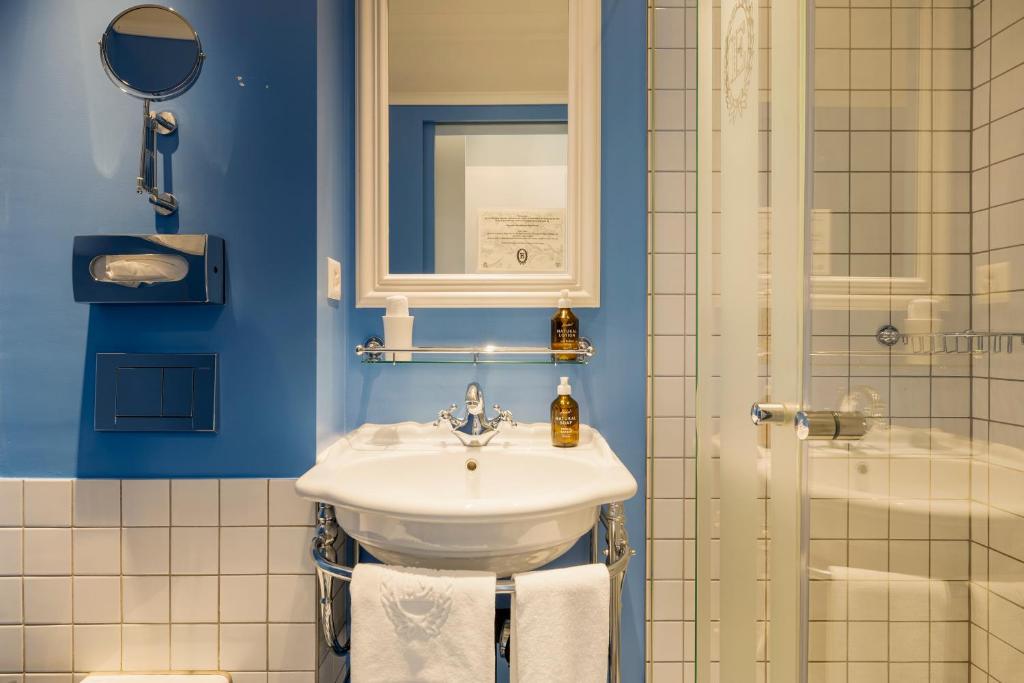 Kylpyhuone majoituspaikassa Hotel Europe