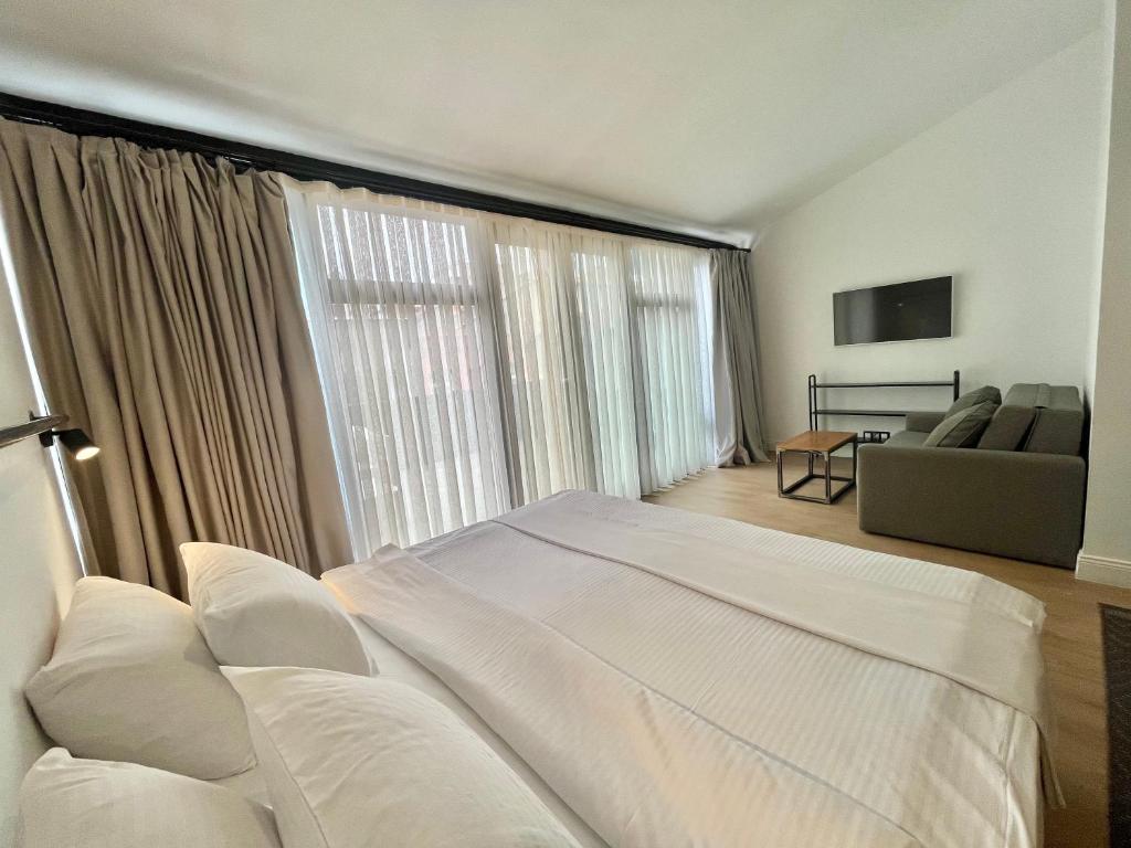Postel nebo postele na pokoji v ubytování Fitas Oda Hotel