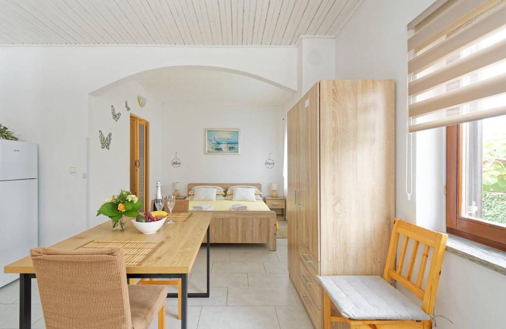 Postel nebo postele na pokoji v ubytování Apartments Grassi by Rent Istria