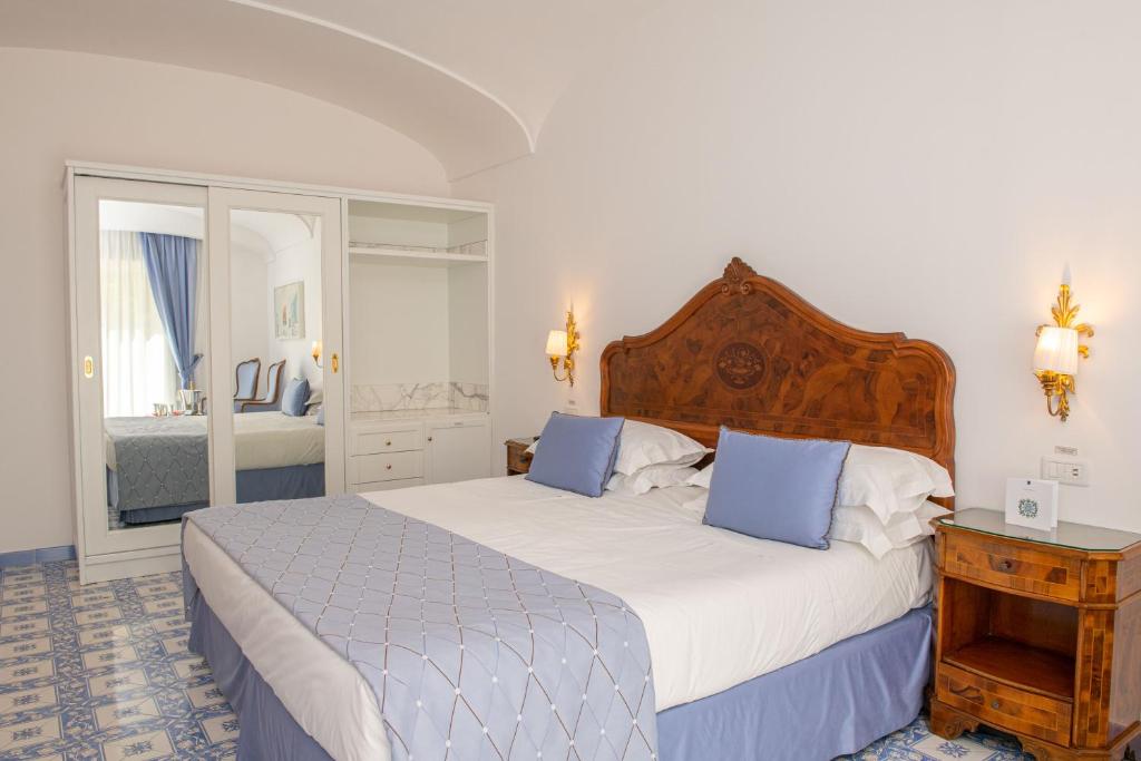Postel nebo postele na pokoji v ubytování Grand Hotel La Favorita