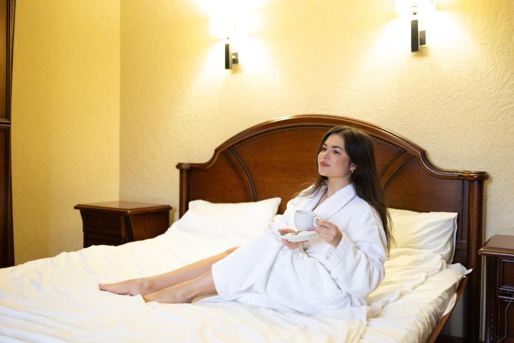 Postel nebo postele na pokoji v ubytování Ruta Resort Polyana