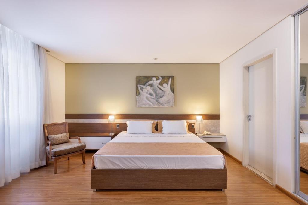 Postel nebo postele na pokoji v ubytování Hotel Crystal