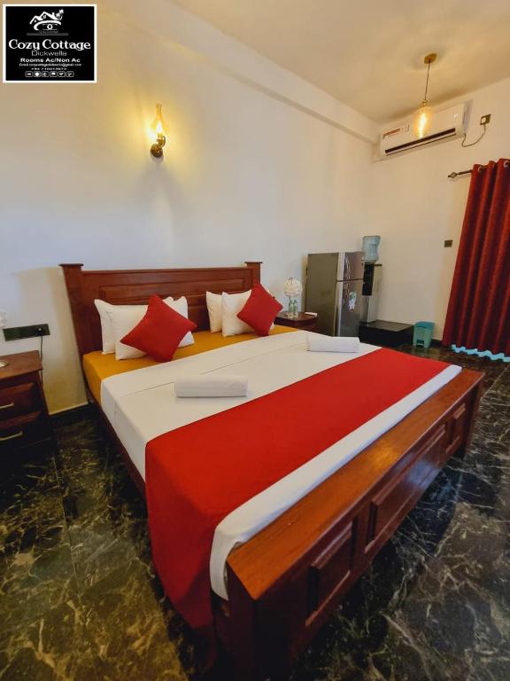 Ένα ή περισσότερα κρεβάτια σε δωμάτιο στο Cozy cottage