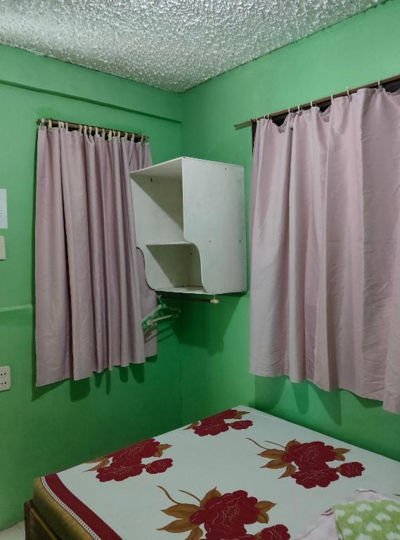 Postel nebo postele na pokoji v ubytování SHENAMAE Pension&Apartel
