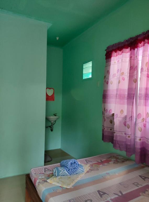 Postel nebo postele na pokoji v ubytování SHENAMAE Pension&Apartel