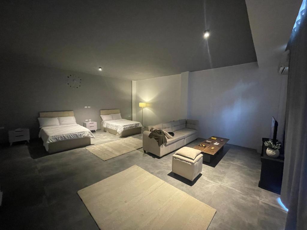 Postel nebo postele na pokoji v ubytování Rove Residence New Cairo