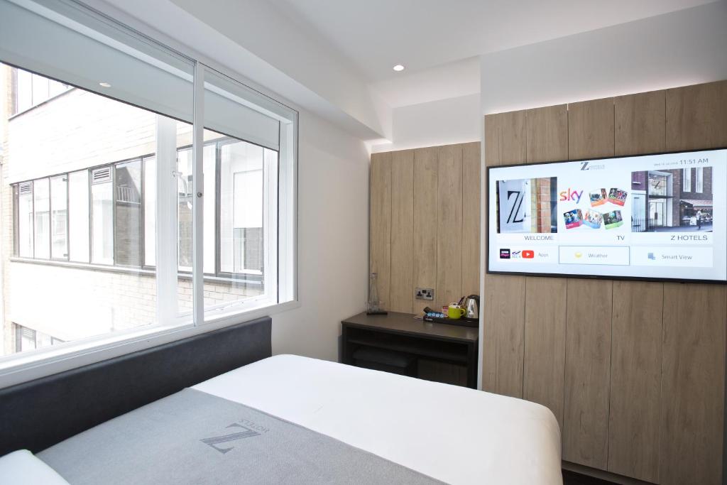Postel nebo postele na pokoji v ubytování The Z Hotel Leicester Square