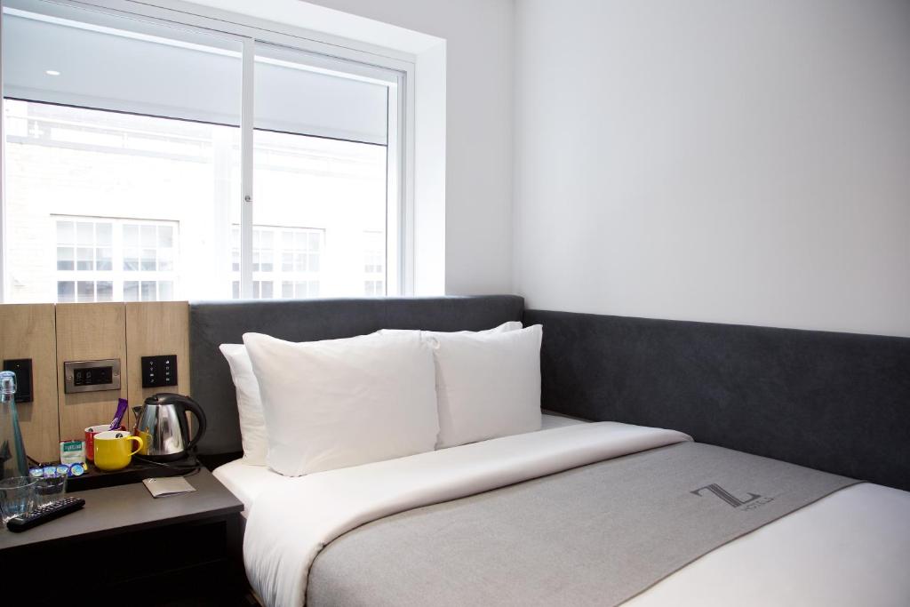 Postel nebo postele na pokoji v ubytování The Z Hotel Leicester Square