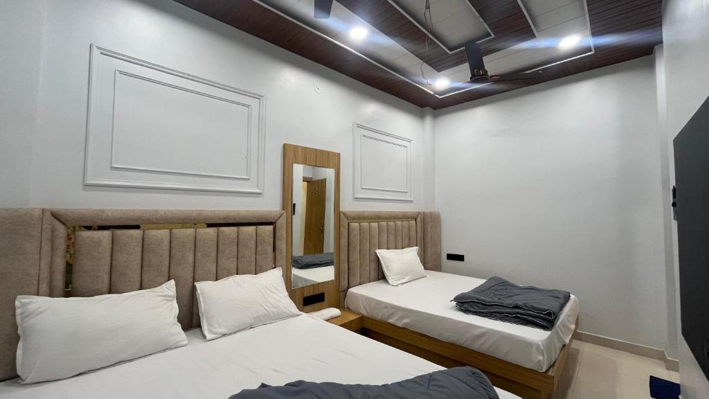 Postel nebo postele na pokoji v ubytování Cloud hotel