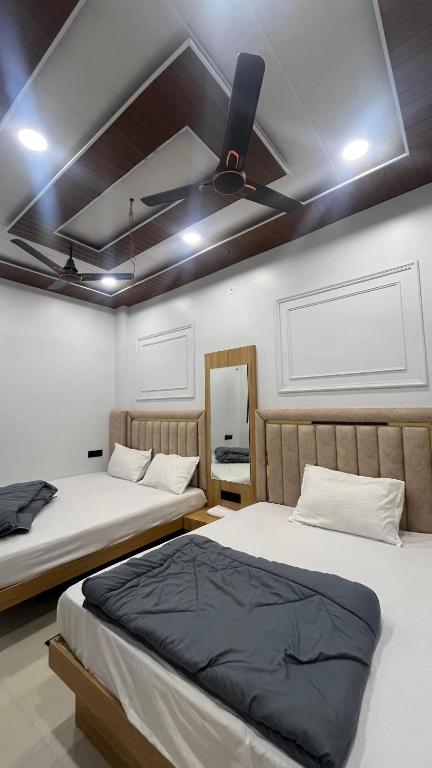 Postel nebo postele na pokoji v ubytování Cloud hotel