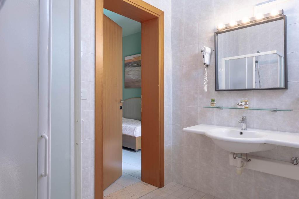 Koupelna v ubytování Hotel Portofino