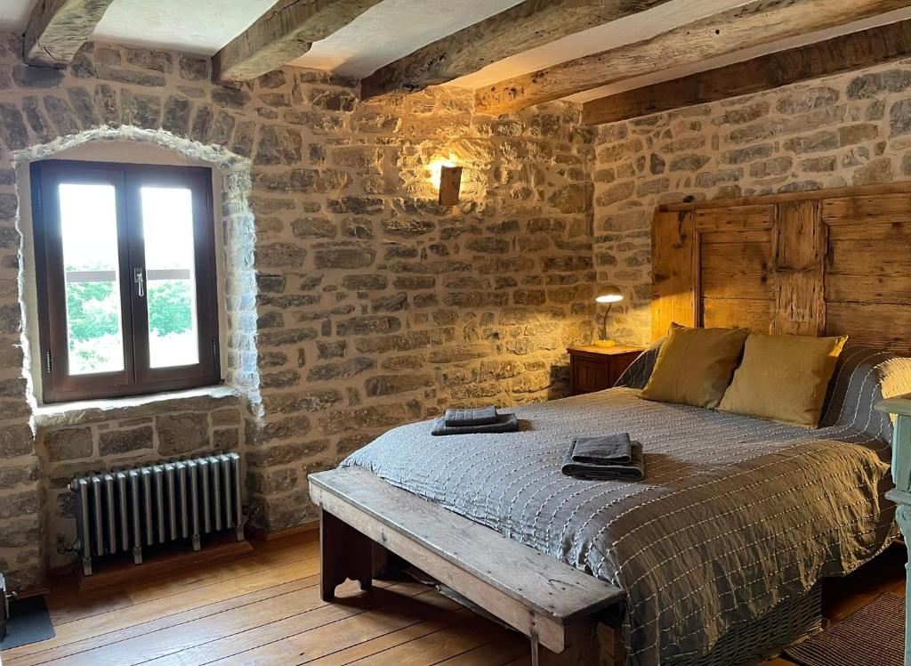 Postel nebo postele na pokoji v ubytování Bolara 60: the Guesthouse