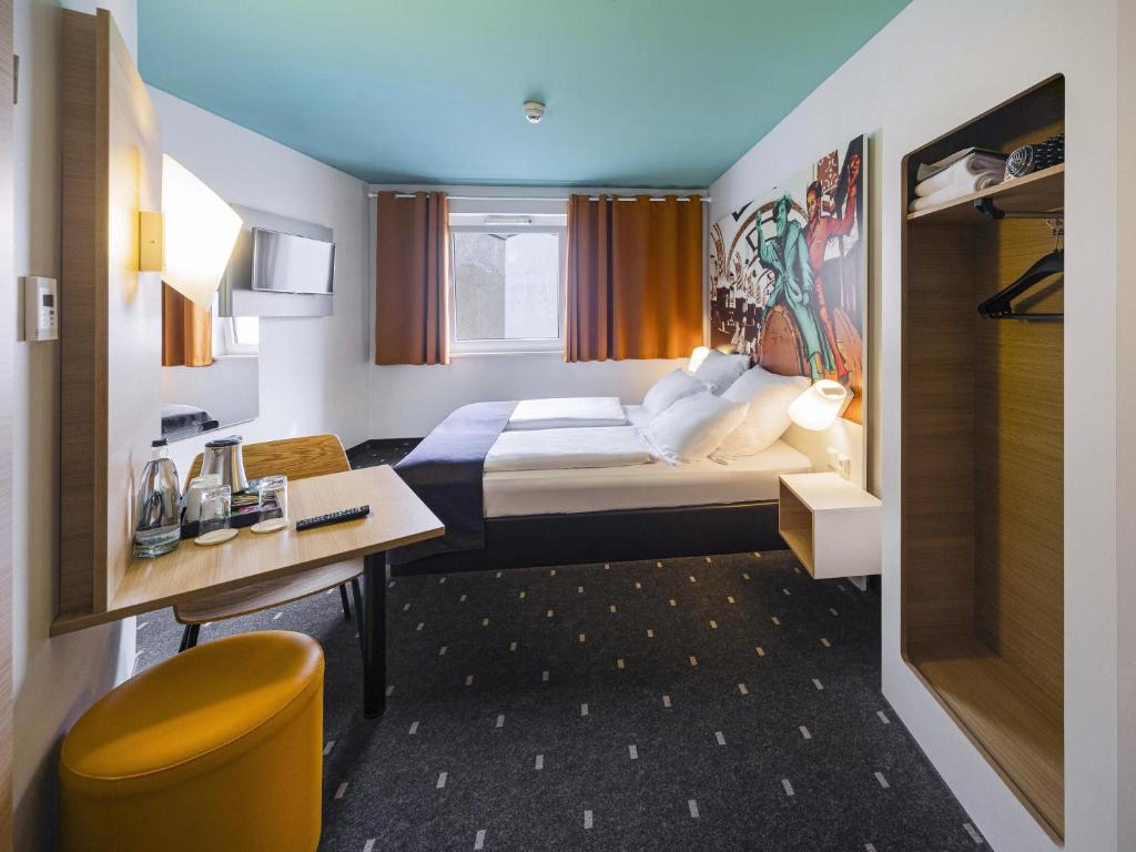 Postel nebo postele na pokoji v ubytování B&B Hotel Leipzig-City