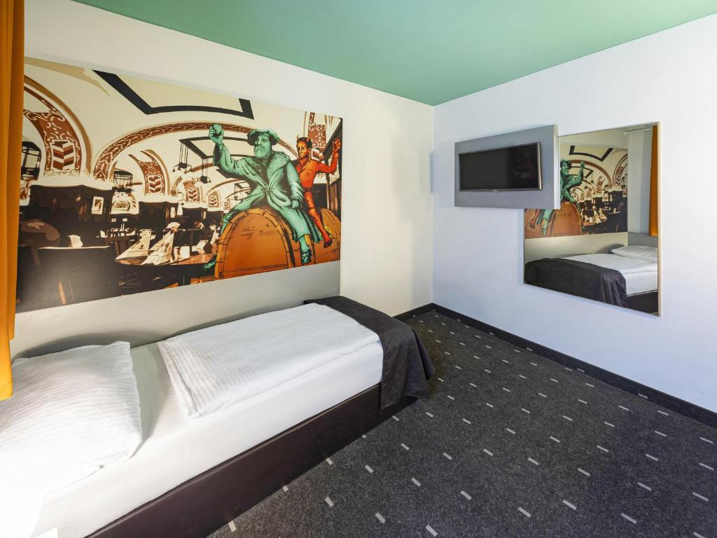 Postel nebo postele na pokoji v ubytování B&B Hotel Leipzig-City