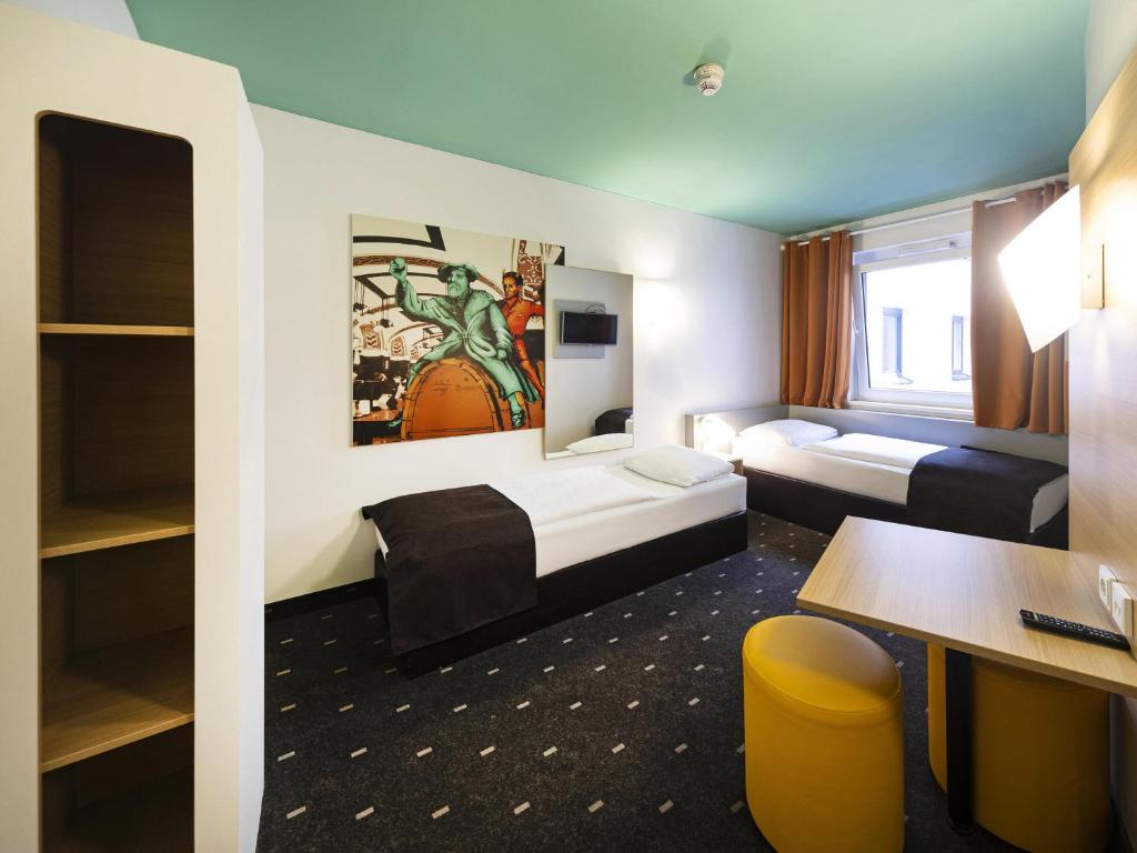 Postel nebo postele na pokoji v ubytování B&B Hotel Leipzig-City
