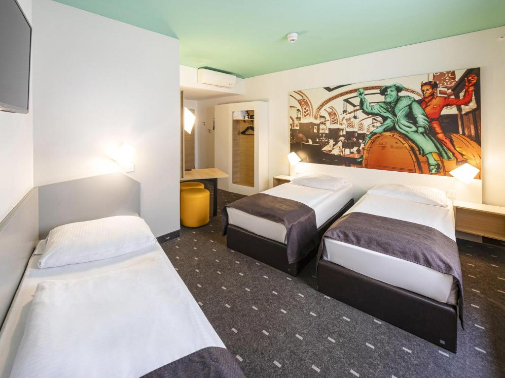 Postel nebo postele na pokoji v ubytování B&B Hotel Leipzig-City