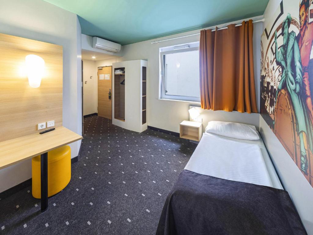 Postel nebo postele na pokoji v ubytování B&B Hotel Leipzig-City