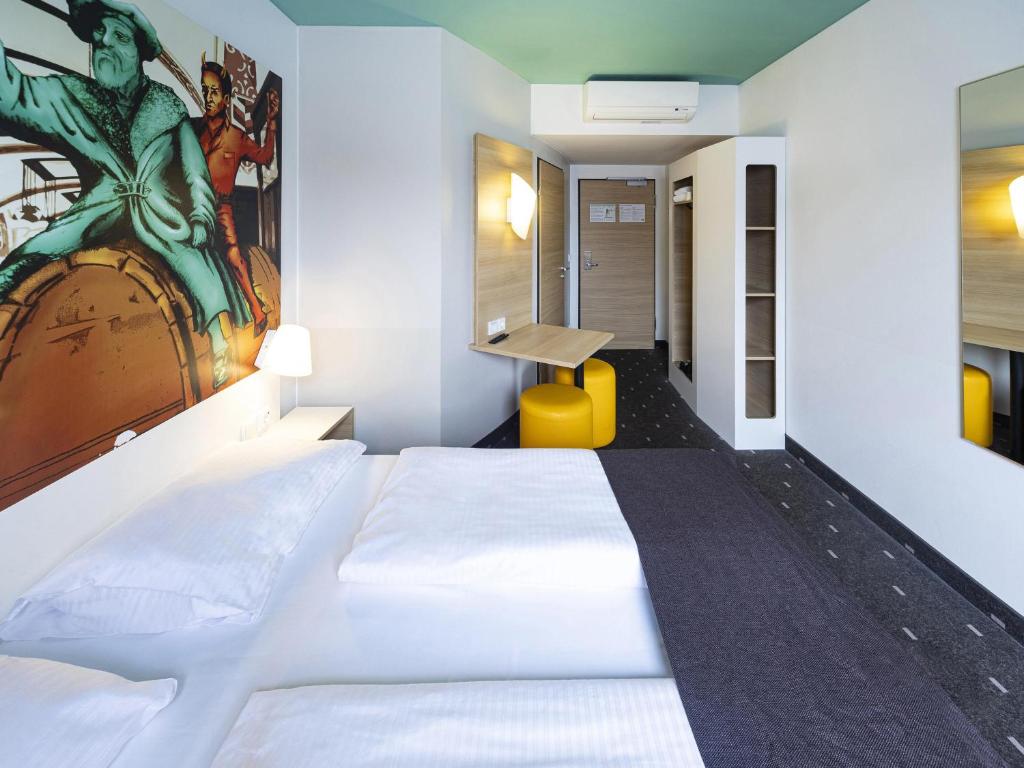 Postel nebo postele na pokoji v ubytování B&B Hotel Leipzig-City