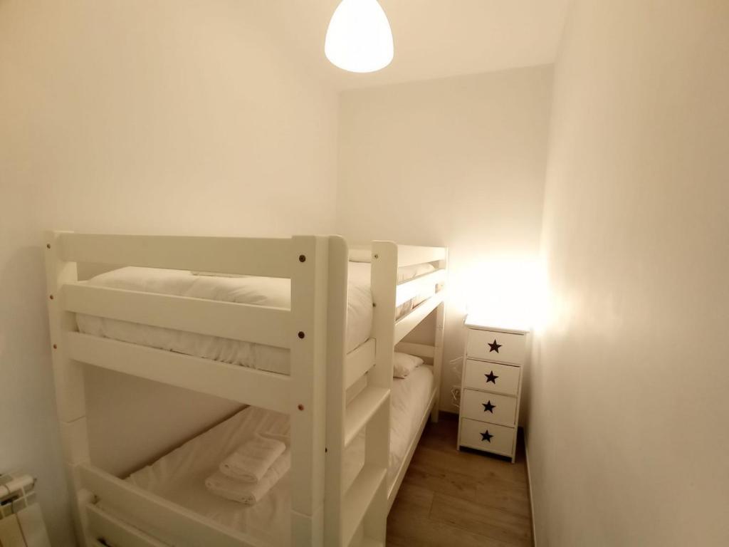 A bed or beds in a room at Cozy in Malasaña