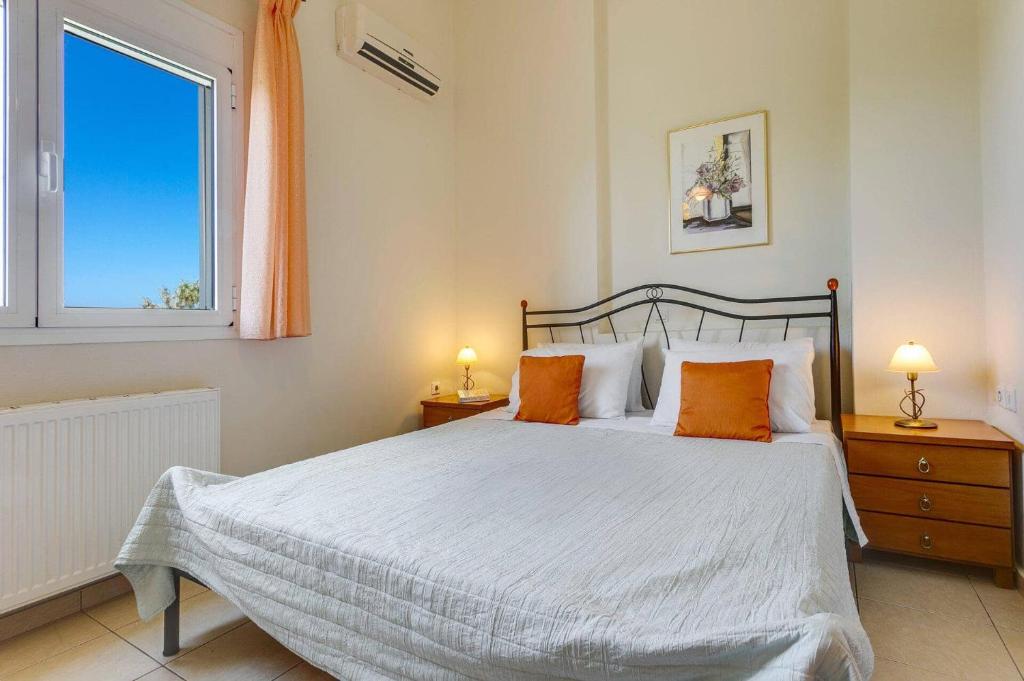 Postel nebo postele na pokoji v ubytování Villa Kastellaki by Villa Plus