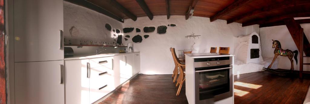 Kuchyň nebo kuchyňský kout v ubytování Casa Rural El Refugio