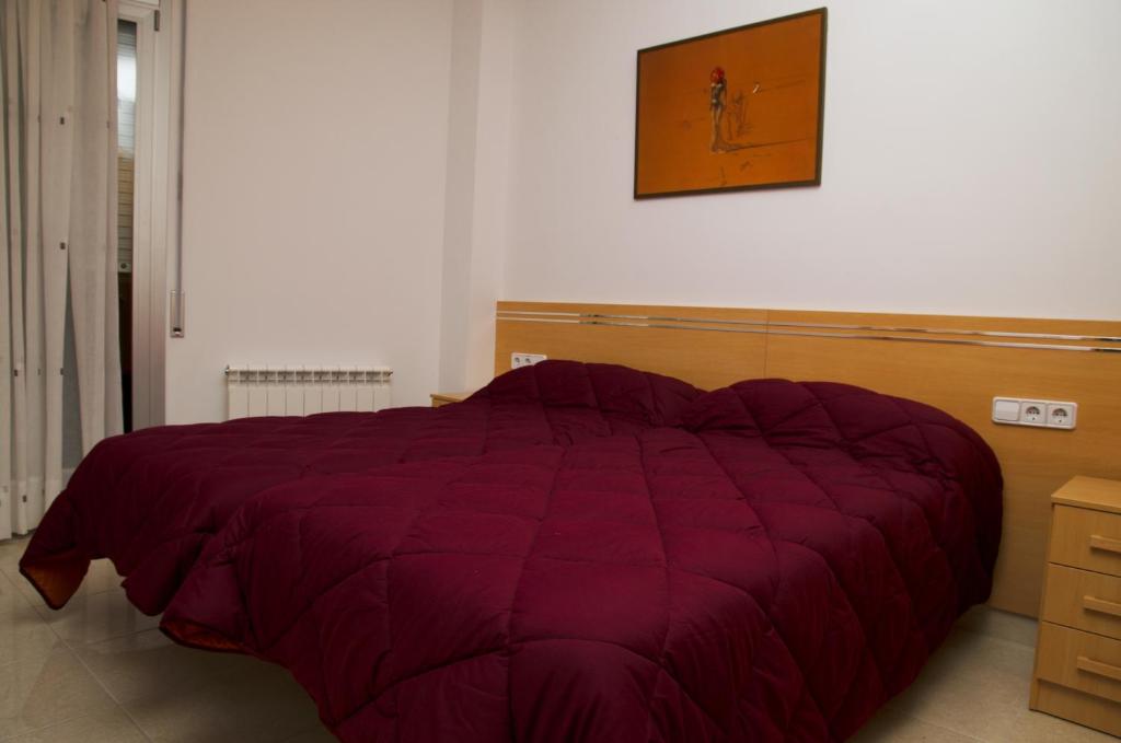 Postel nebo postele na pokoji v ubytování Apartamentos Navas