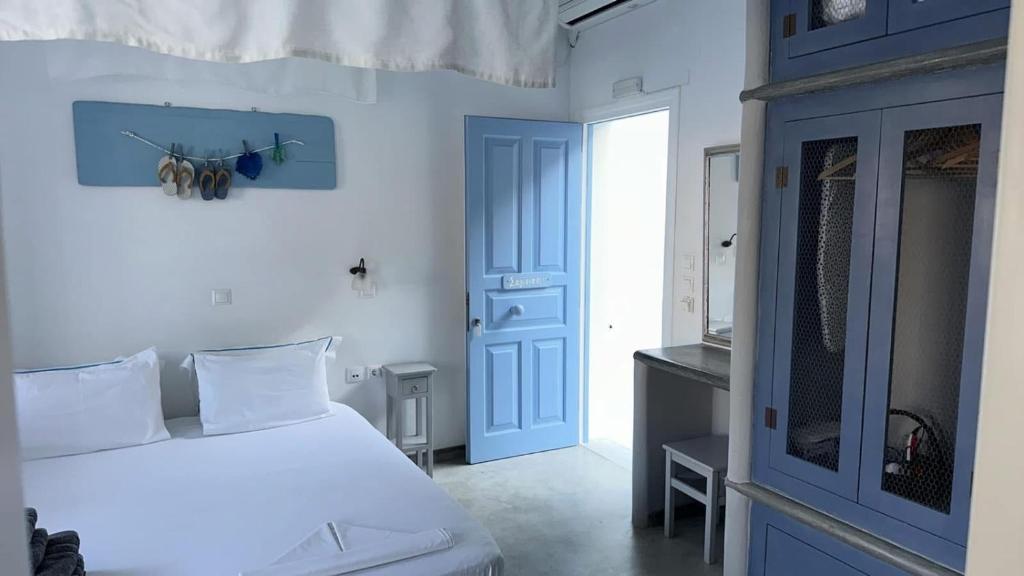 Postel nebo postele na pokoji v ubytování Amfitriti Serifos