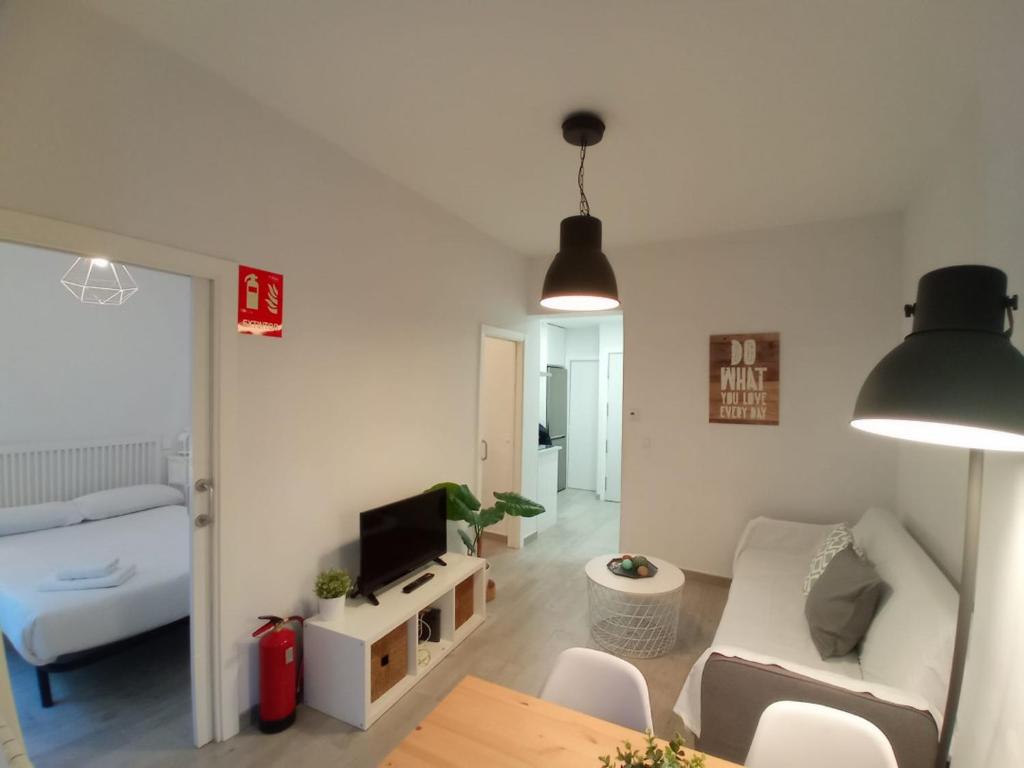 A television and/or entertainment centre at Cozy in Malasaña