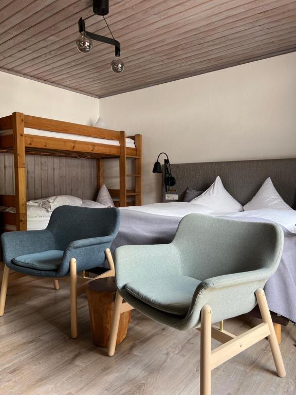 Postel nebo postele na pokoji v ubytování Lifesport Hotel Hechenmoos
