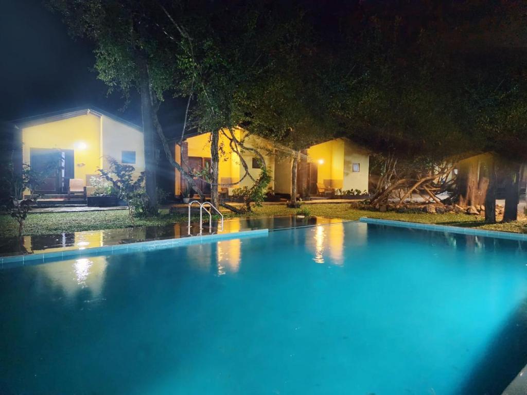 Bazén v ubytování Sigiri Resort nebo v jeho okolí