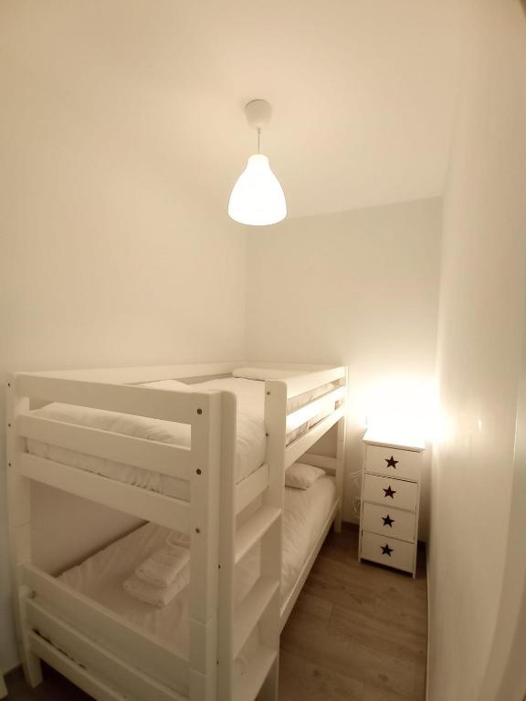A bed or beds in a room at Cozy in Malasaña