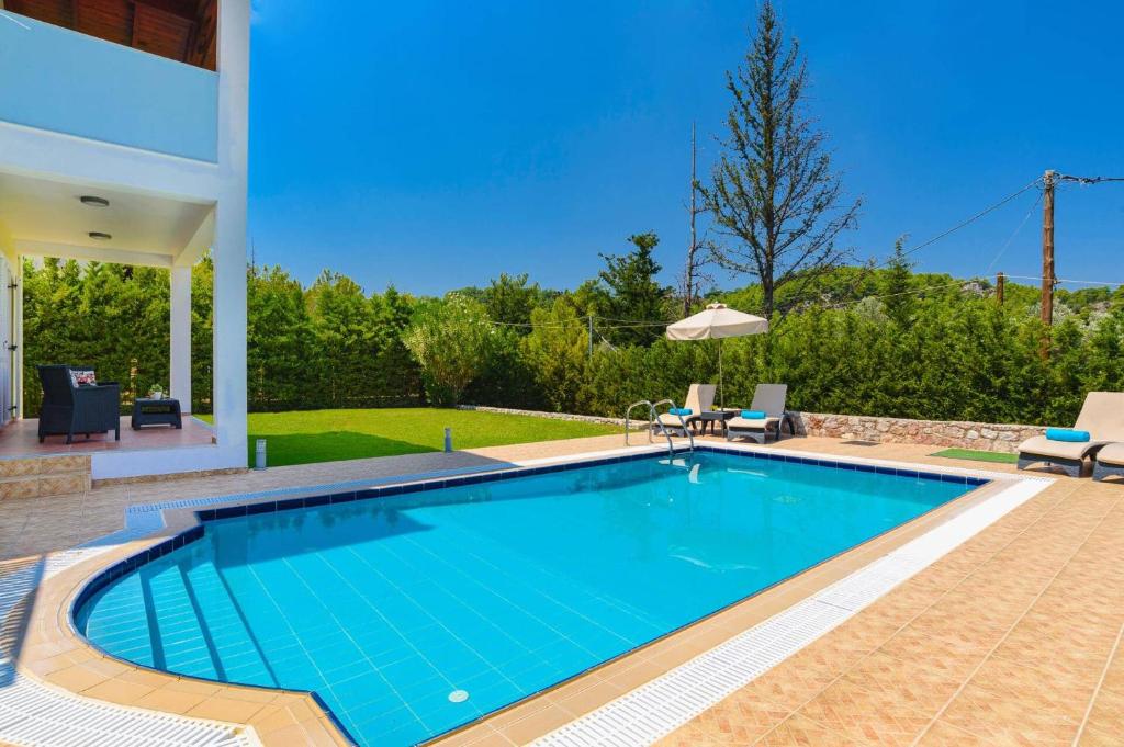The swimming pool at or close to Villa Apollo Springs by Villa Plus