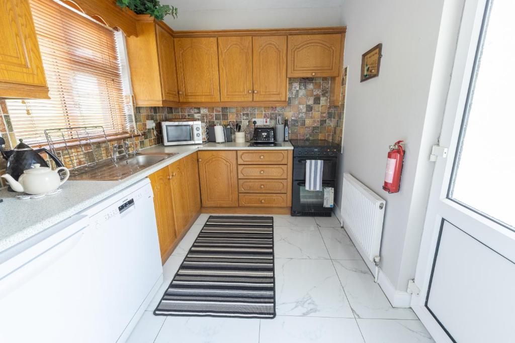 Kuchyň nebo kuchyňský kout v ubytování Brielle House