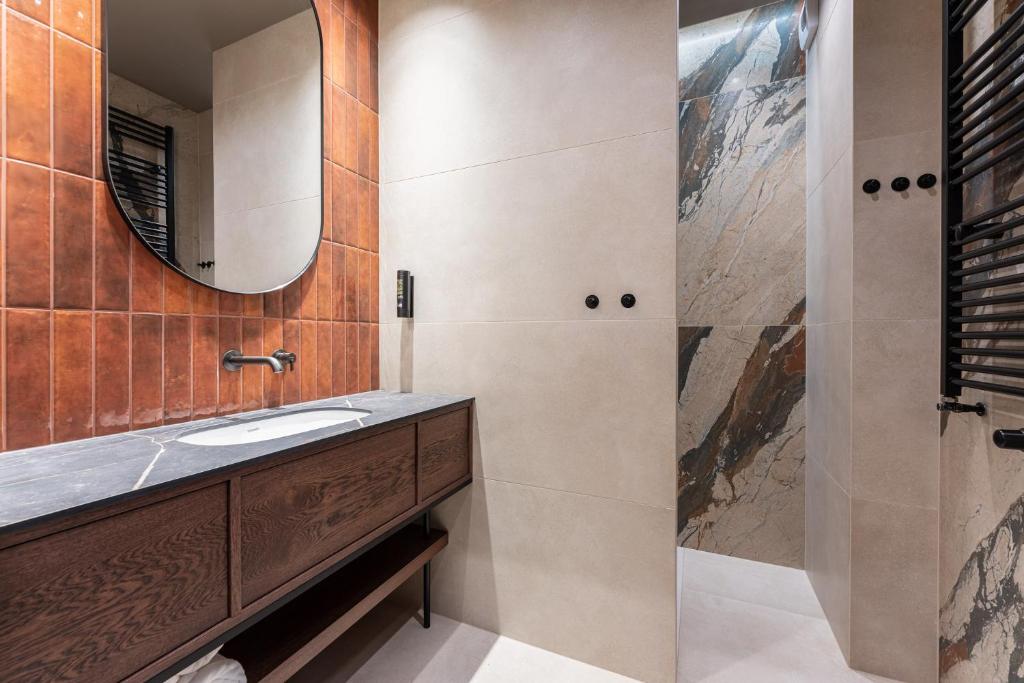 Koupelna v ubytování Lavoo Boutique Apartments