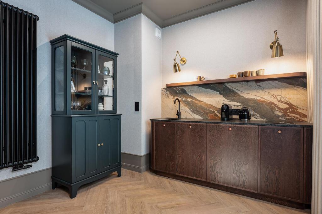 Kuchyň nebo kuchyňský kout v ubytování Lavoo Boutique Apartments