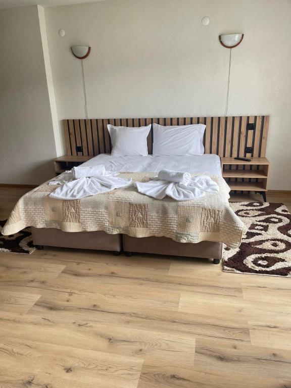 Postel nebo postele na pokoji v ubytování Guest House Raffe