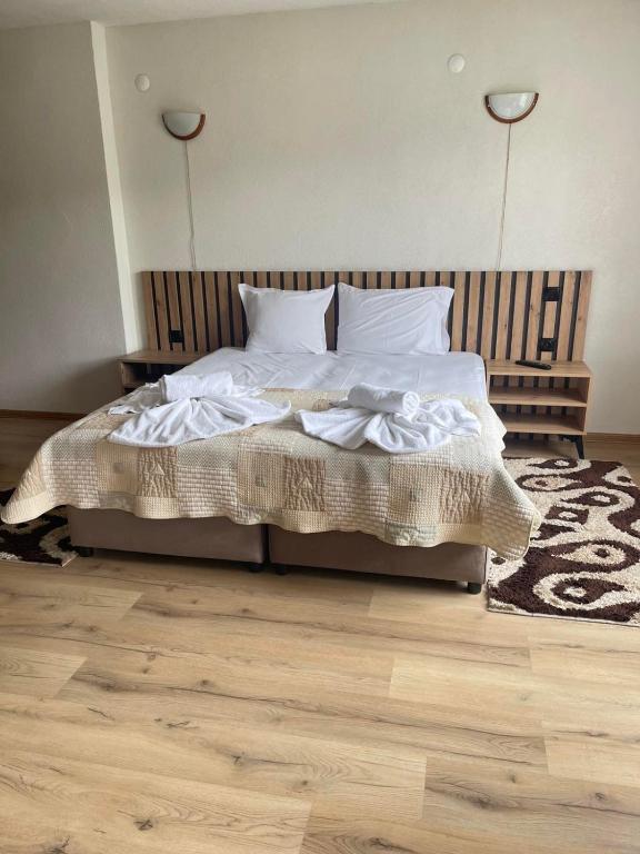 Postel nebo postele na pokoji v ubytování Guest House Raffe