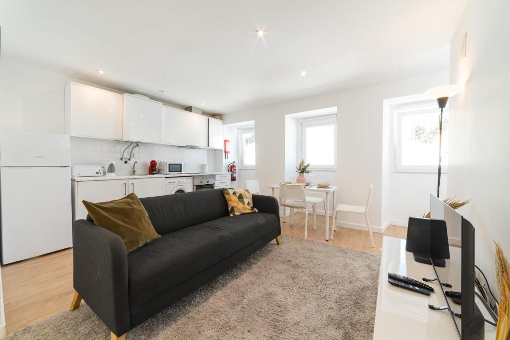 Η κουζίνα ή μικρή κουζίνα στο Cruzeiro Charm Apartments