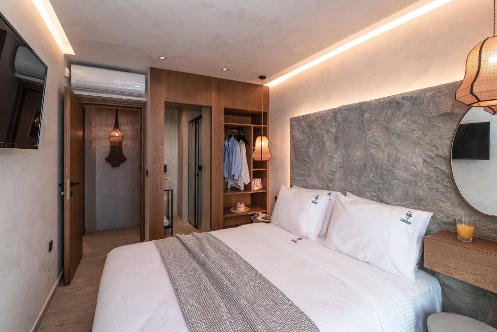 Postel nebo postele na pokoji v ubytování Villa Helios