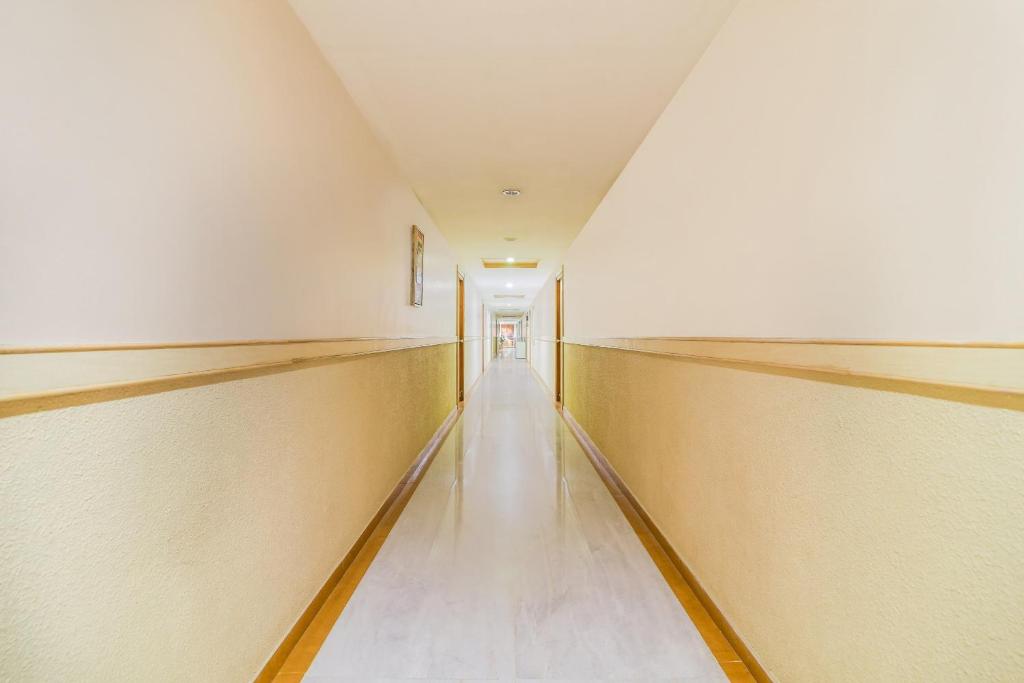 Fotografie z fotogalerie ubytování Capital O Grand Plaza v destinaci Kójamputtúr