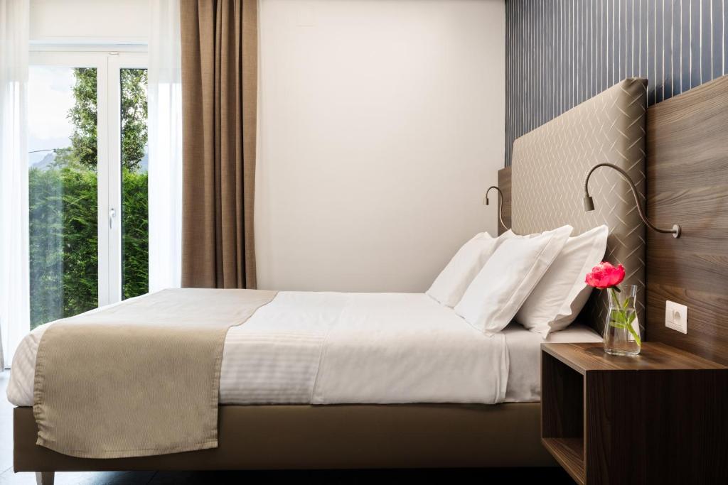 Posteľ alebo postele v izbe v ubytovaní Likò Resort