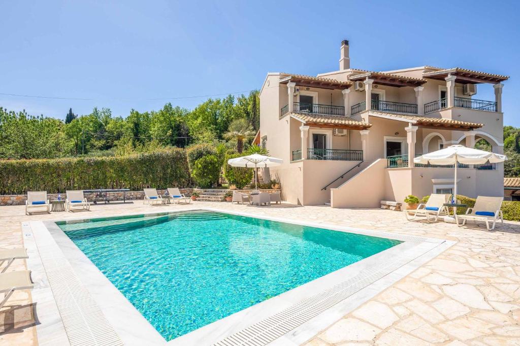 The swimming pool at or close to Villa Nafsika
