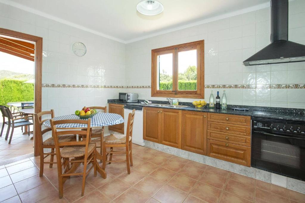 Kuchyň nebo kuchyňský kout v ubytování Villa Vidrier I by Villa Plus
