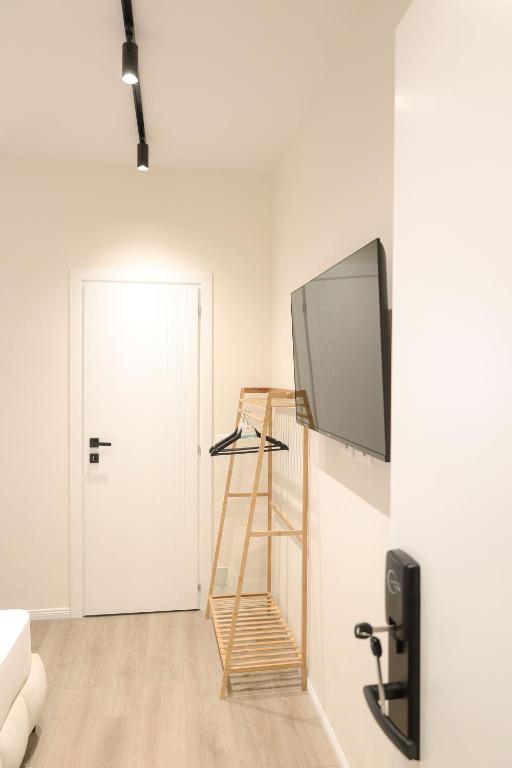 TV a/nebo společenská místnost v ubytování Tiara Apartments