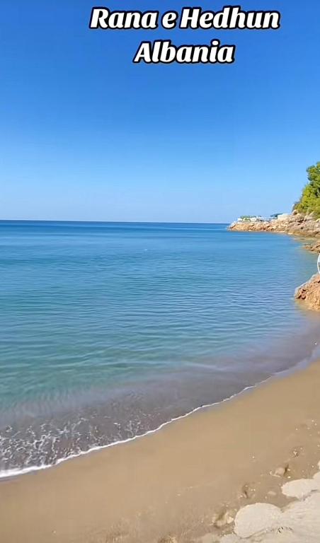 a view of the ocean from the shore of a beach at Shtepipushimi23 Rana e Hedhun in Shëngjin