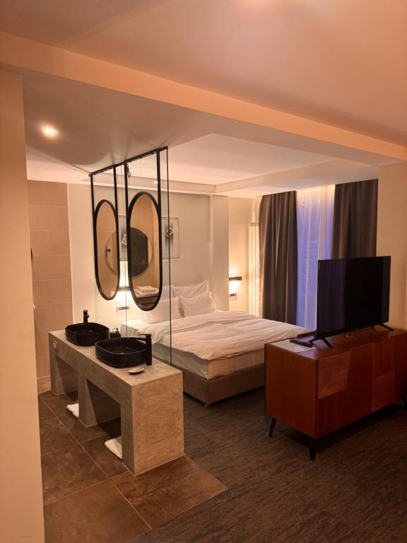 Postel nebo postele na pokoji v ubytování Hotel Pljevlja