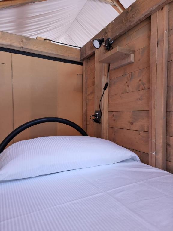 Postel nebo postele na pokoji v ubytování Casa Sgarlata Glamping - Tenda Olivastro