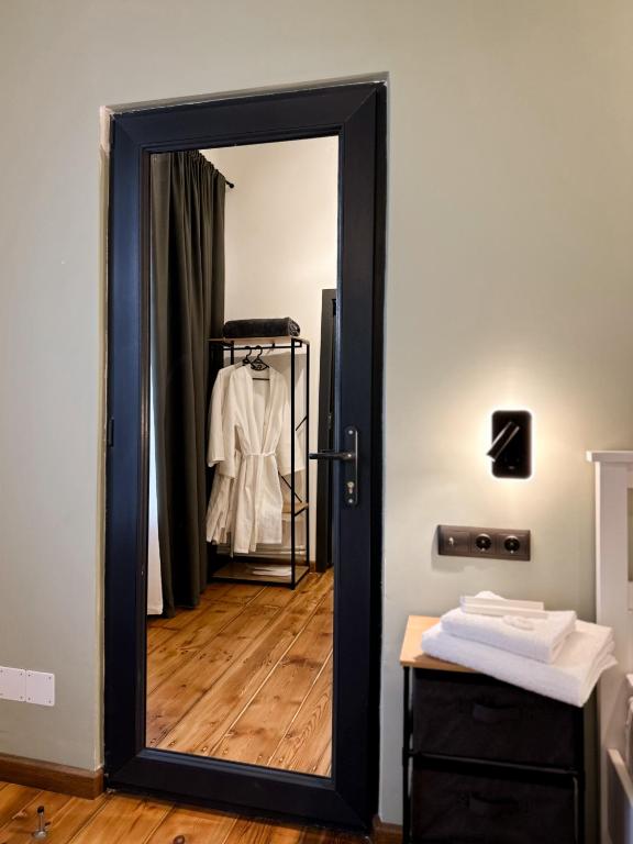 Postel nebo postele na pokoji v ubytování Tiroents Hotel