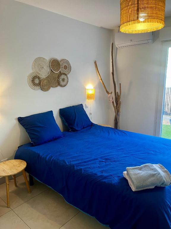 Posteľ alebo postele v izbe v ubytovaní Duplex piscine 3 chambres et Clim proche plages